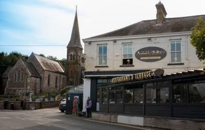 Azzurro Bar & Restaurant and its terrace on Dock Road, beside the church in Dunmore East